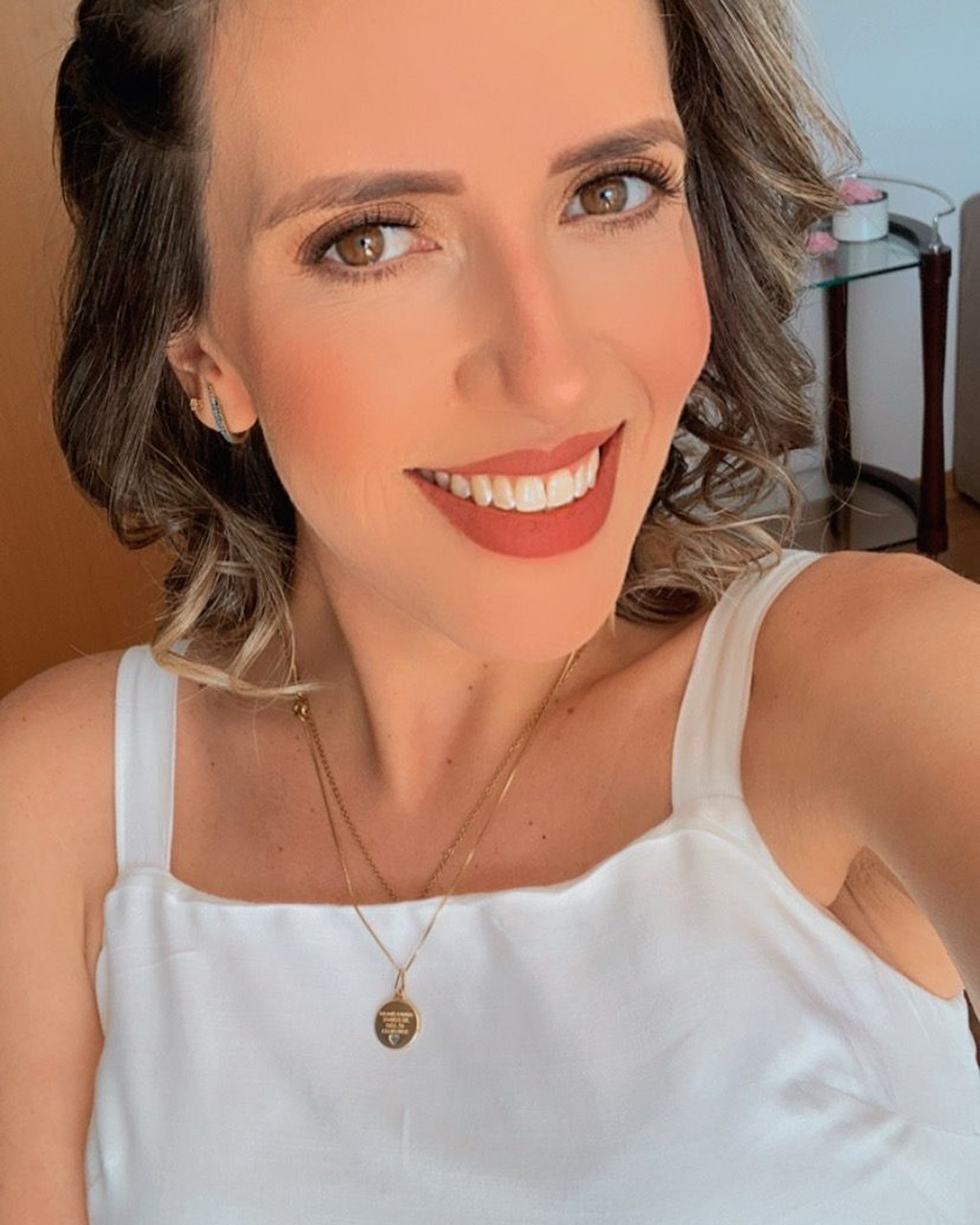 Retrato profissional da Tia Tay, consultora materno infantil